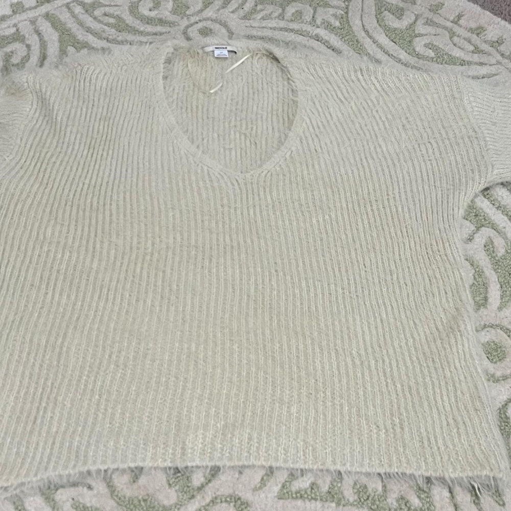Small Urban Outfitters white oversized fluffy sweater.